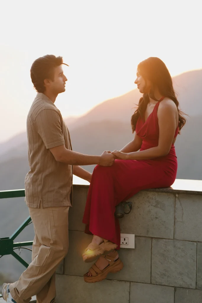 Romantic proposal photography with a couple enjoying golden hour mountain views