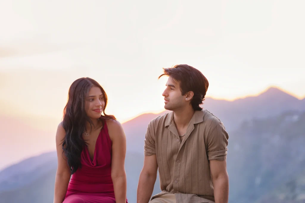 Proposal shoot in Mussoorie featuring a couple sharing a romantic moment at sunset