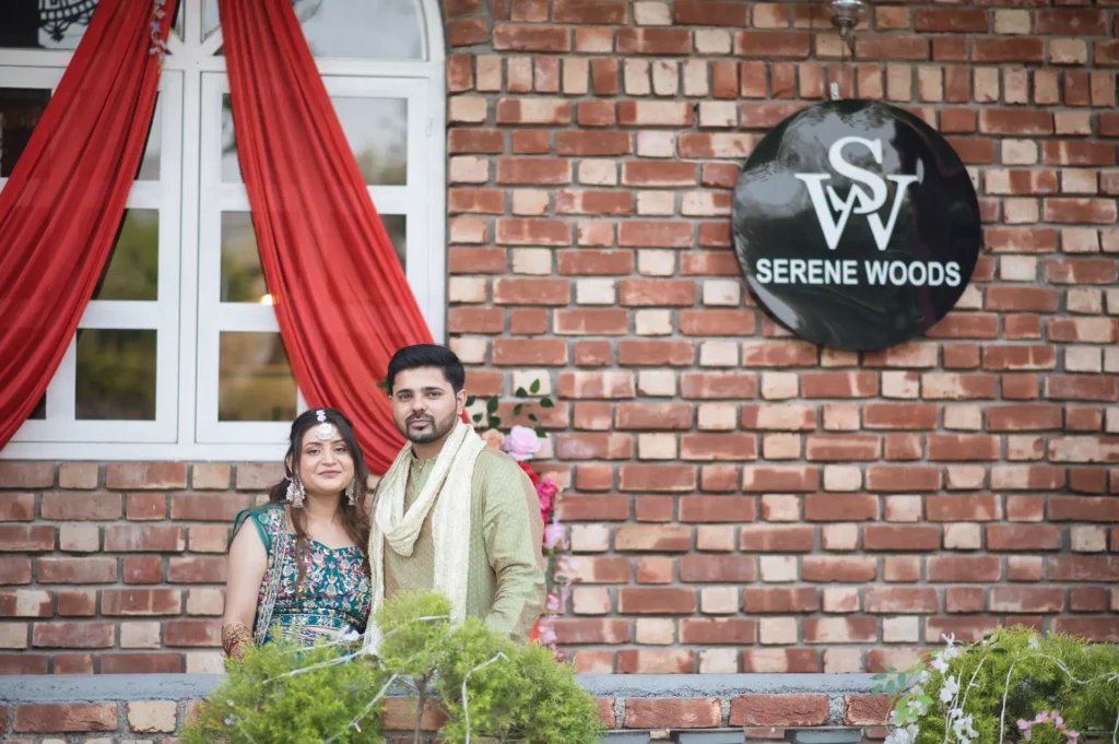 Wedding Photography capturing Tanya and Dhruv posing at Serene Woods venue during their pre-wedding celebration in Dehradun
