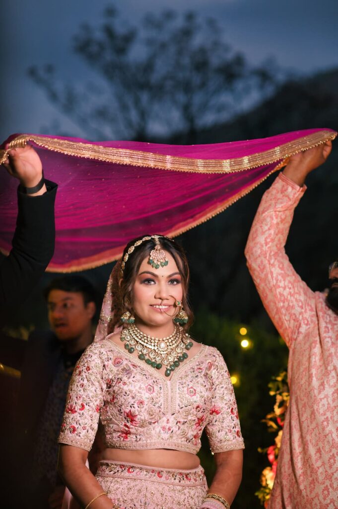 Bridal entry under dupatta by wedding photographers in Dehradun