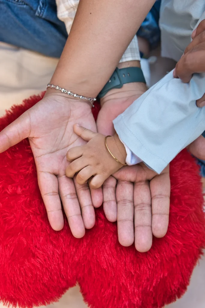First Birthday family hands portrait symbolizing love, togetherness, and precious memories