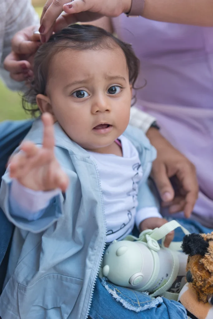 First Birthday candid portrait of baby Jiyansh during his milestone celebration