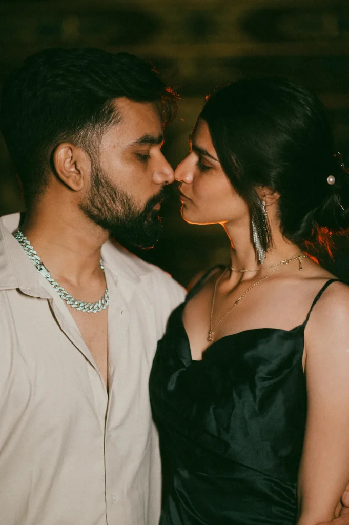 Romantic close-up of a couple sharing an intimate moment with cinematic evening lighting