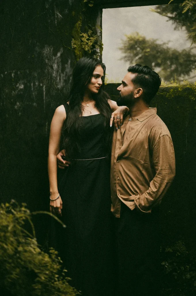 Elegant couple posing in a heritage doorway during a Pre Wedding Shoot in Mussoorie with natural light