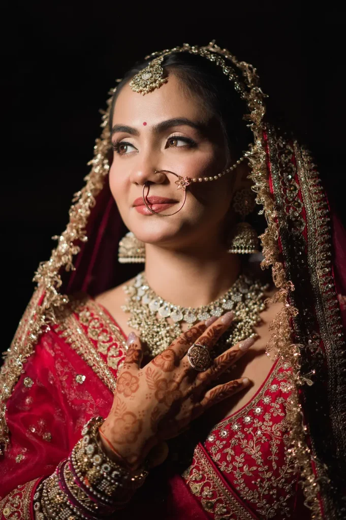 Close-up bridal portrait highlighting traditional jewellery and graceful expression.