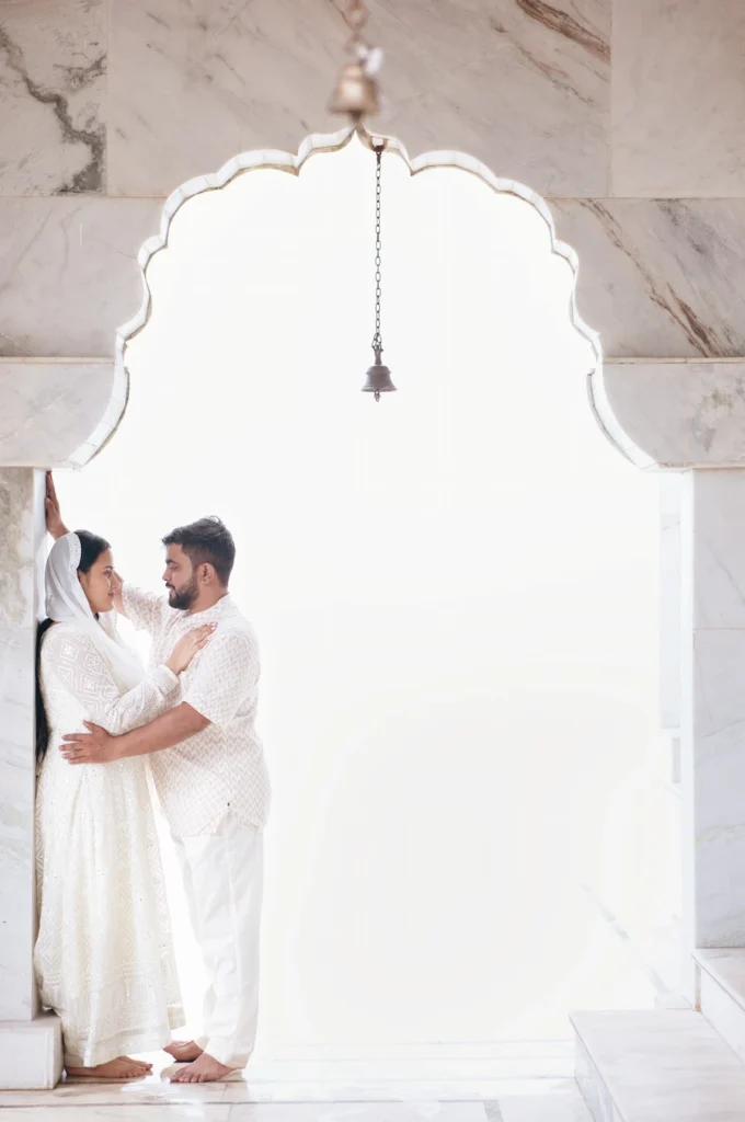 Traditional Pahadi Pre-Wedding photoshoot under marble temple arches with mountain views