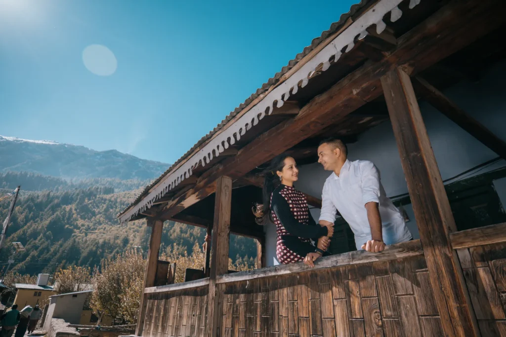 Couple walking together on a picturesque mountain road surrounded by nature
