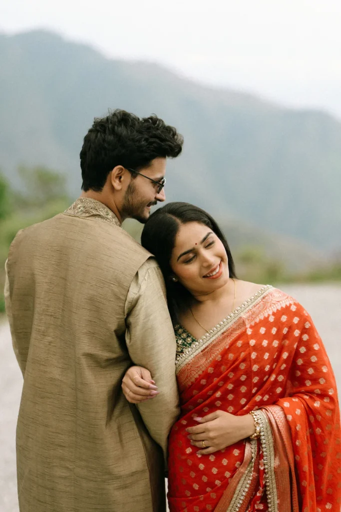 Traditional Pahadi Pre-Wedding couple portrait with Himalayan mountain views in Uttarakhand