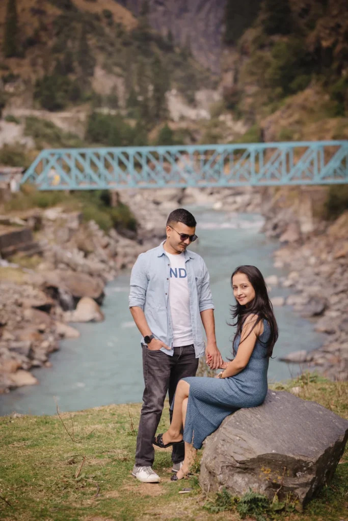 Romantic couple portrait beside a mountain river in Uttarakhand