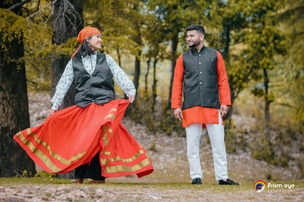 Traditional Pahadi Pre-Wedding couple in authentic Uttarakhand attire during a mountain photoshoot in Dehradun