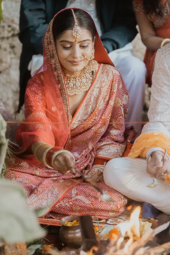 Bride performing sacred wedding rituals during Destination Weddings in the Himalayas