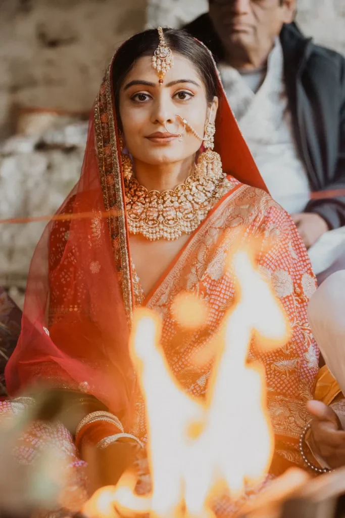 Traditional bride performing sacred wedding rituals during Destination Weddings in Uttarakhand