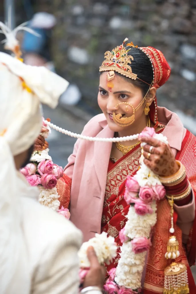 Traditional bride exchanging floral garlands during Destination Weddings ceremony