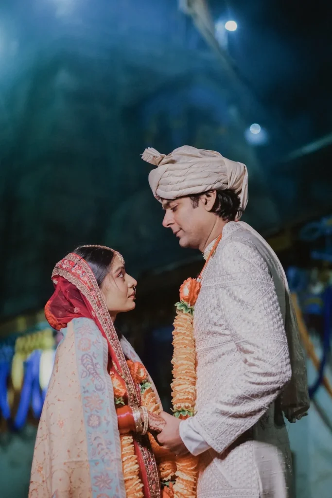 Bride and groom sharing an emotional moment during the sacred marriage rituals.