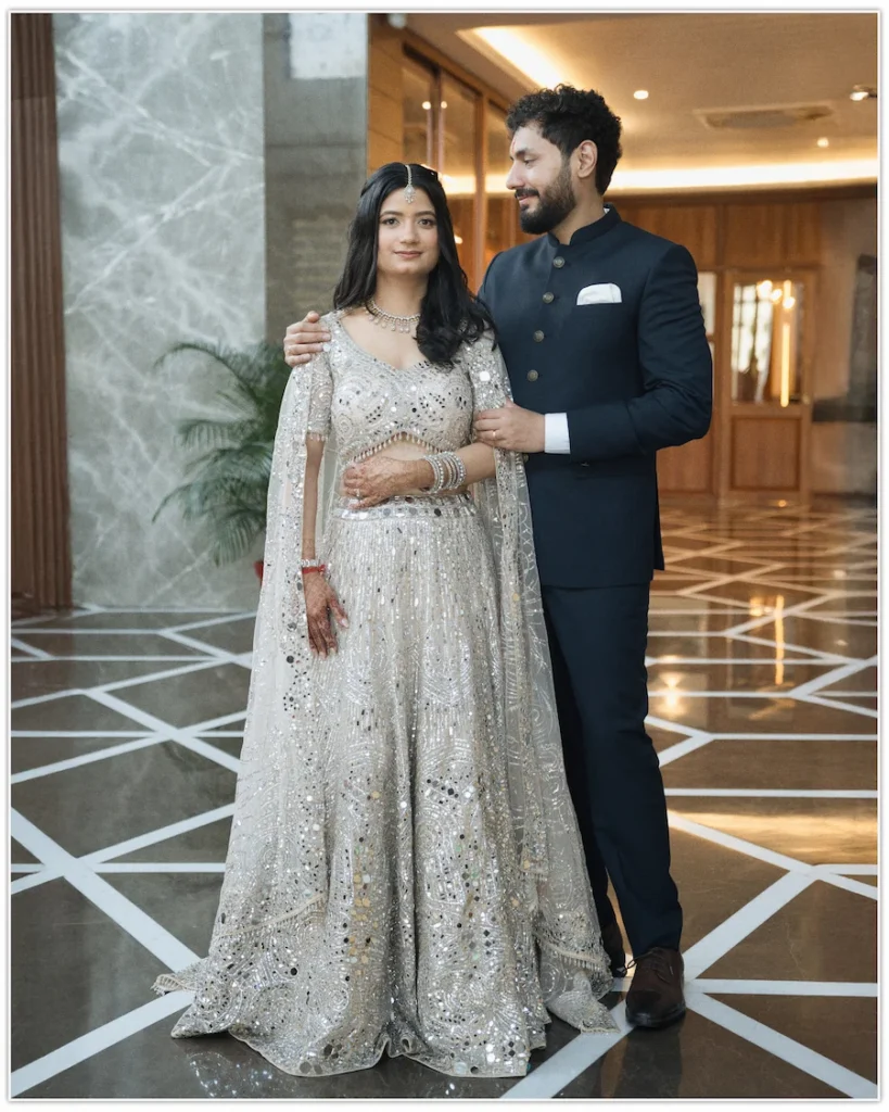 Couple sharing a graceful engagement portrait in a luxurious indoor venue.