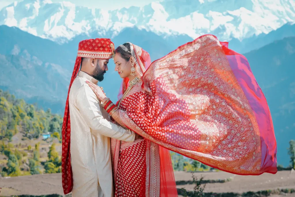 Destination Weddings couple portrait with snow-capped Himalayan peaks in the background