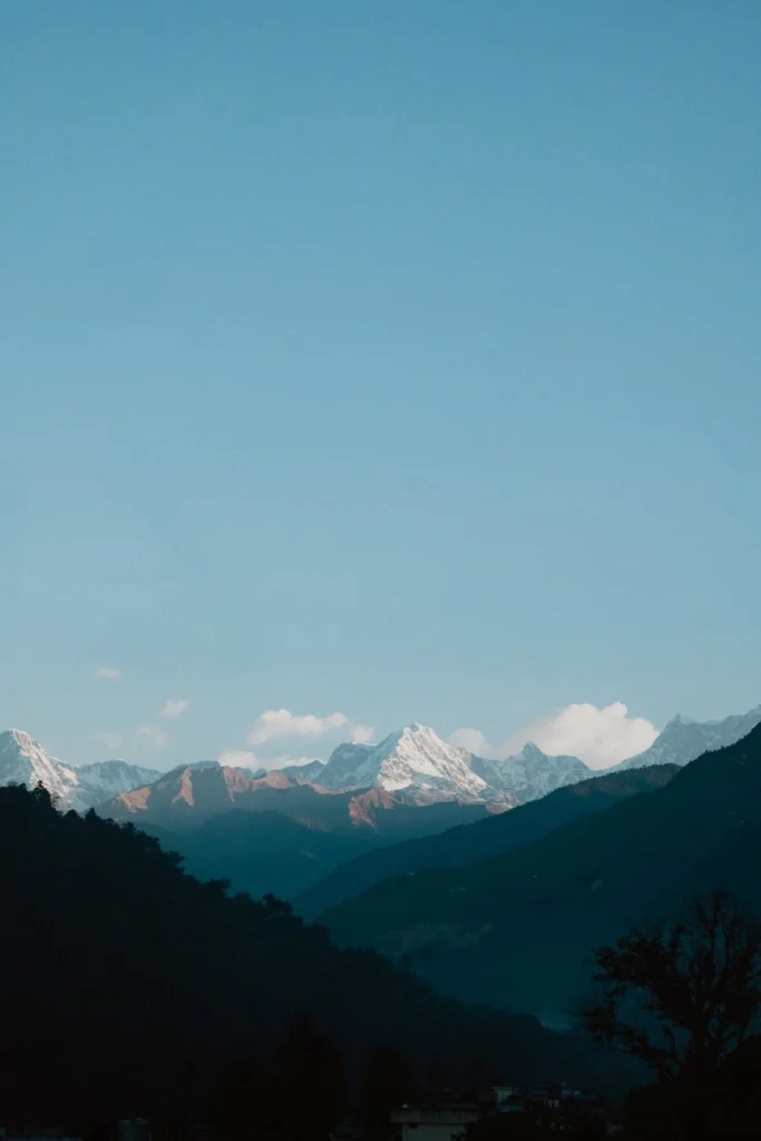 Wedding landscape featuring the majestic Himalayan mountain range surrounding the wedding destination in Uttarakhand.
