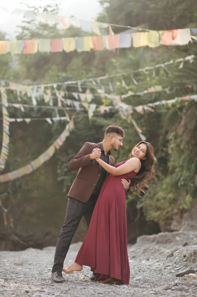 Romantic riverside couple dance captured during the best time for pre-wedding shoot in Dehradun