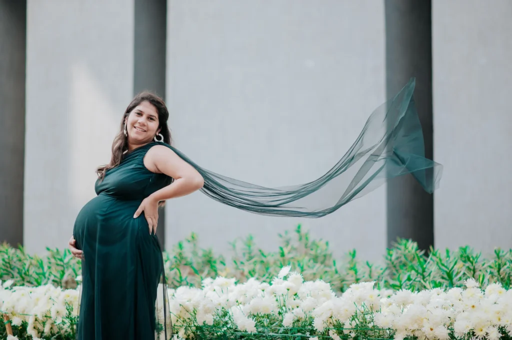 Graceful motherhood portrait with flowing maternity gown