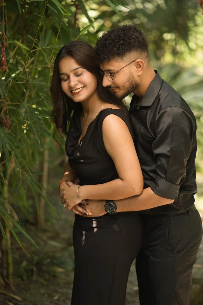 Romantic outdoor couple session in lush greenery during the best time for pre-wedding shoot in Dehradun
