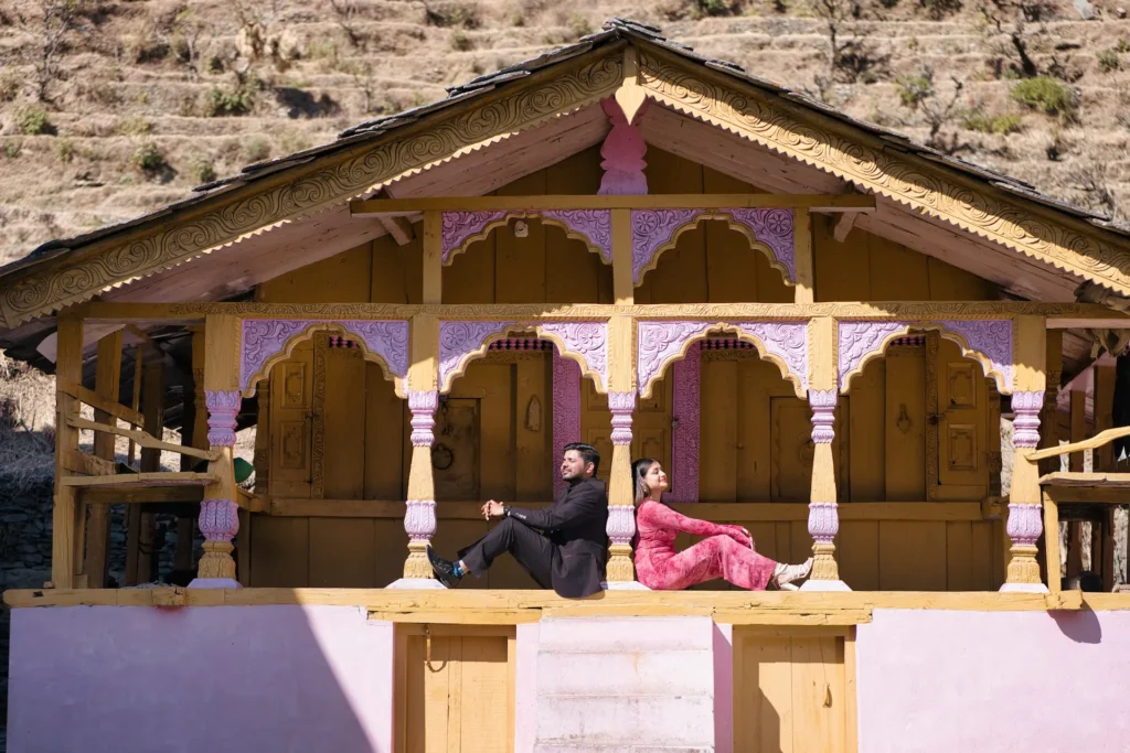 Traditional Pahadi house pre wedding photoshoot in Uttarakhand featuring authentic mountain architecture and cultural storytelling.