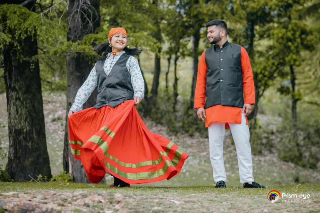 Couple enjoying a traditional Uttarakhand wedding celebration in nature