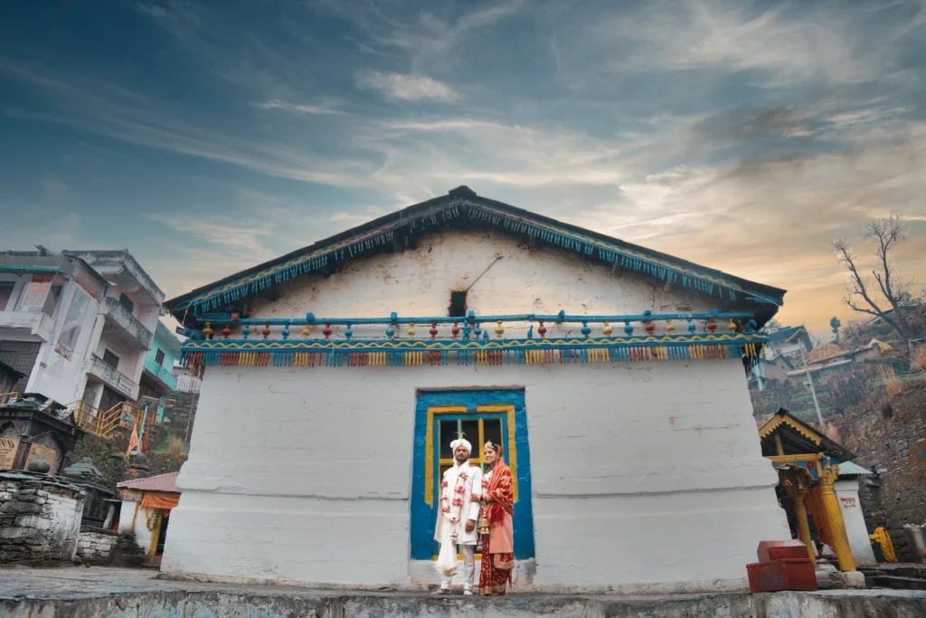 Destination Wedding in Uttarakhand couple portrait at Triyuginarayan Temple with Himalayan backdrop