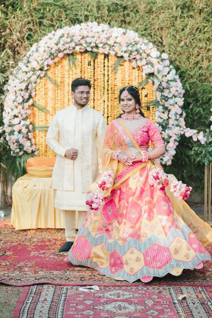 Elegant wedding portrait of bride and groom in traditional attire