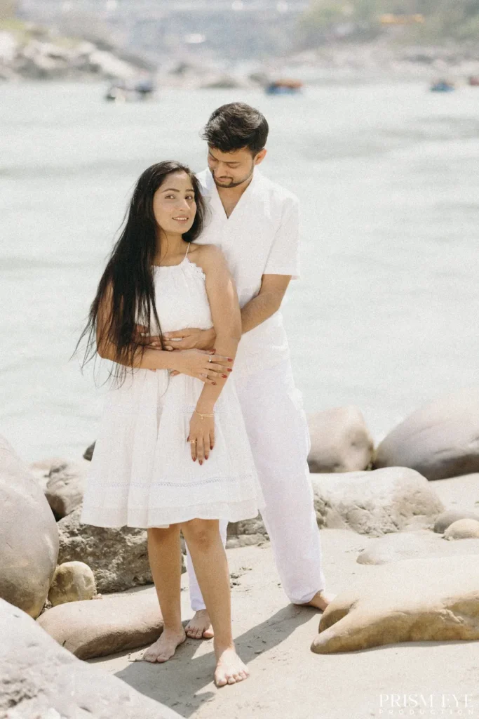 Couple posing by the Ganga River during a Pre-Wedding Shoot in Rishikesh
