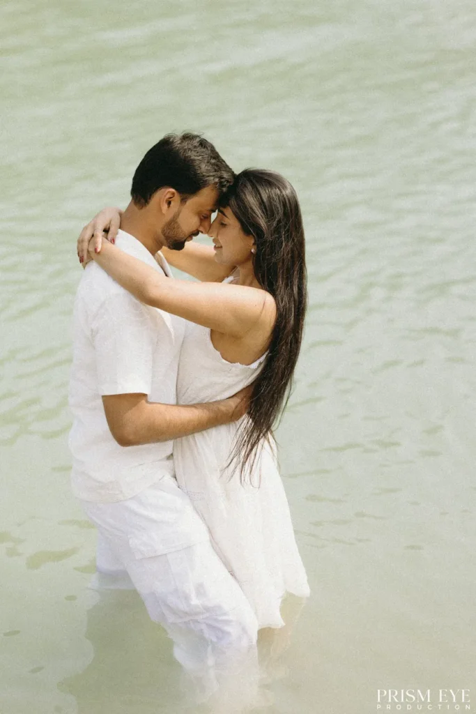Romantic riverside moment during a Pre-Wedding Shoot in Rishikesh by the Ganga River