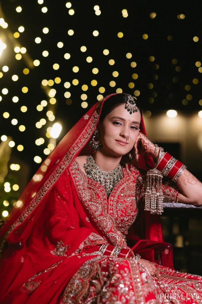Elegant bridal portrait with decorative lights at destination wedding in Uttarakhand 