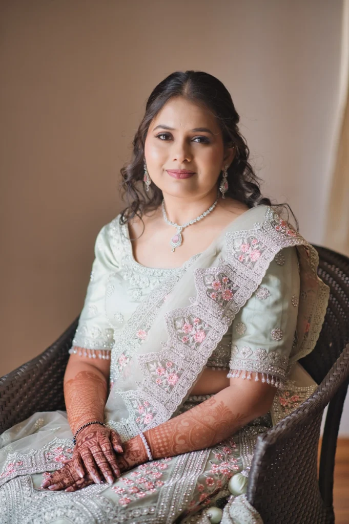 A serene and graceful portrait of the bride, captured while getting ready in her elegant traditional attire, by Prism Eye Productions.