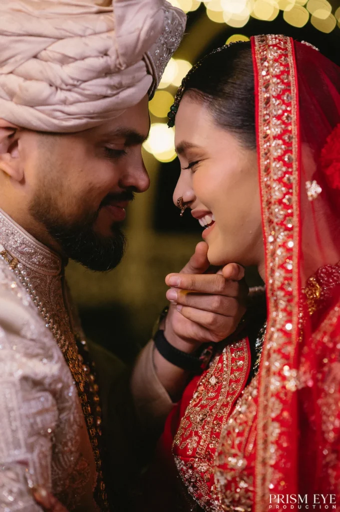 Romantic candid moment of bride and groom during destination wedding in Rishikesh