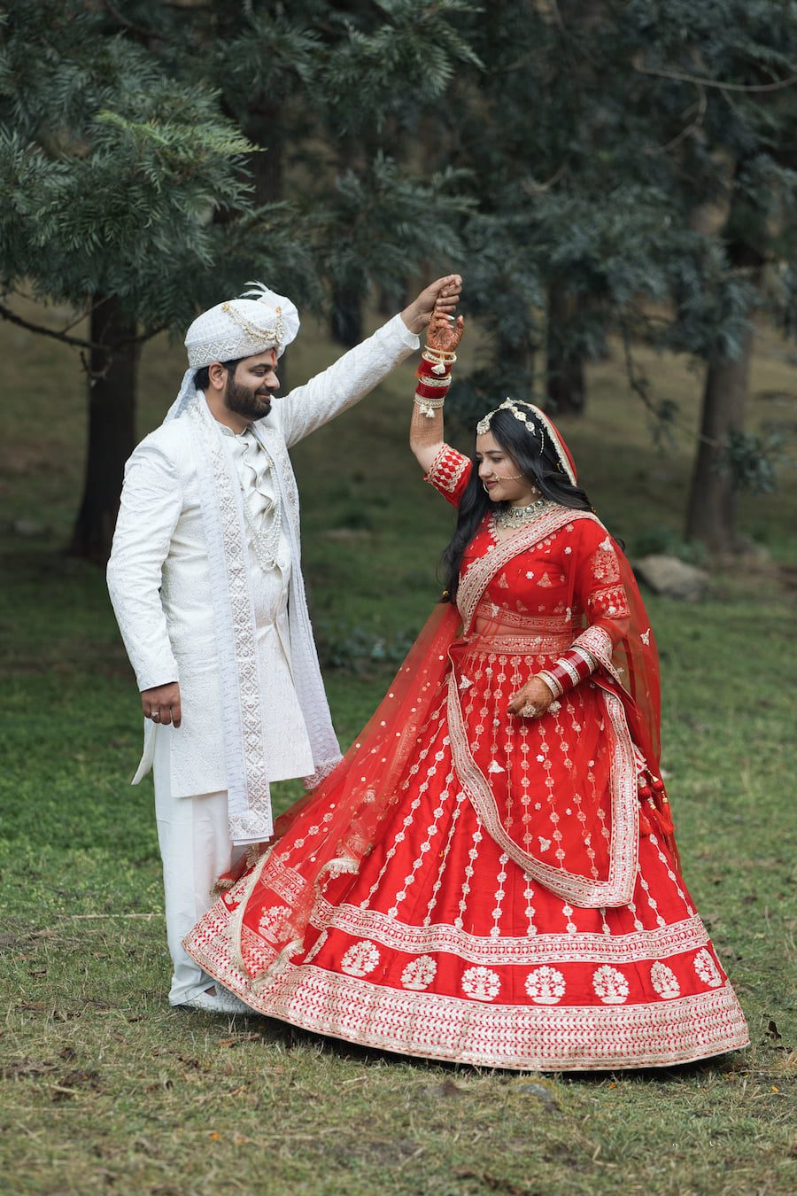 Bride and groom celebrating at a destination wedding venue in Dehradun