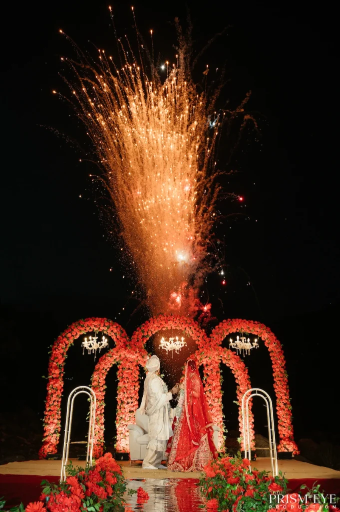 Romantic wedding stage portrait with fireworks during destination wedding in Uttarakhand