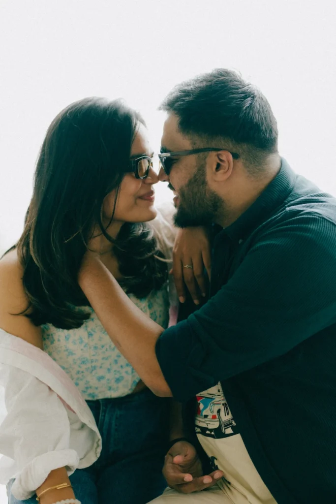 Couple sharing a romantic moment during a pre-wedding shoot at Gun Hill in Mussoorie