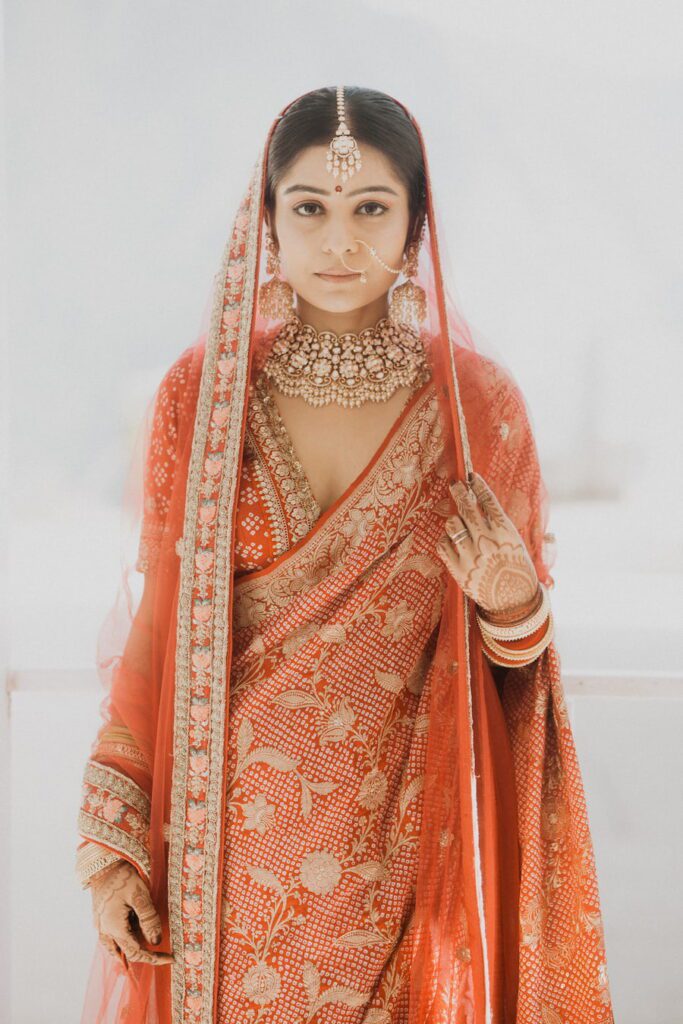 Bride in traditional wedding attire at ITC WelcomeHotel The Savoy Mussoorie wedding venue