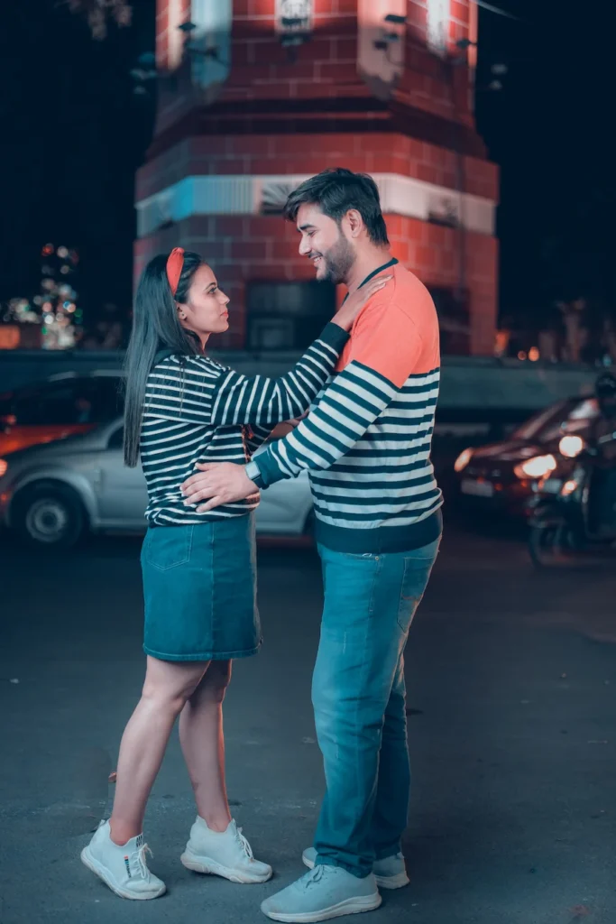 Couple enjoying an evening pre-wedding shoot on the vibrant Mall Road in Mussoorie