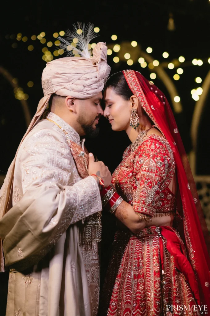 Luxury destination wedding couple shoot in Rishikesh featuring bride and groom under decorative lights captured by Prism Eye Productions