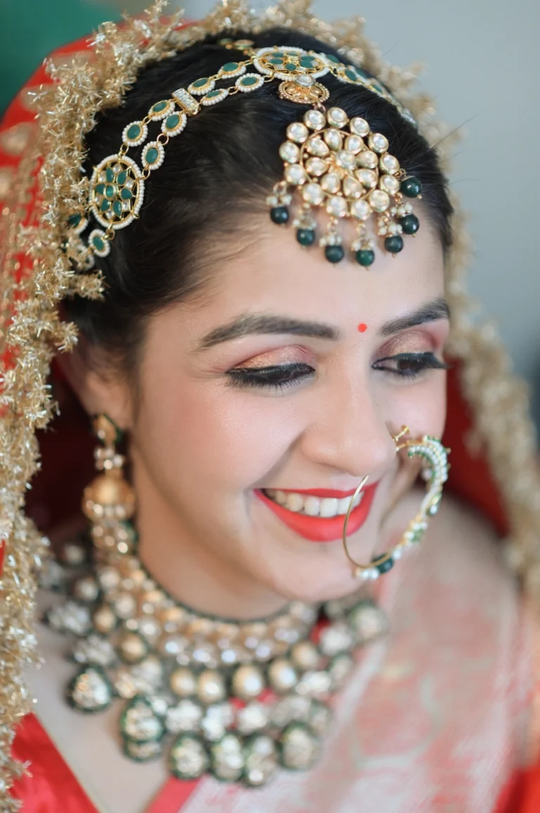 smiling-bride-closeup-red-bridal-look-uttarakhand