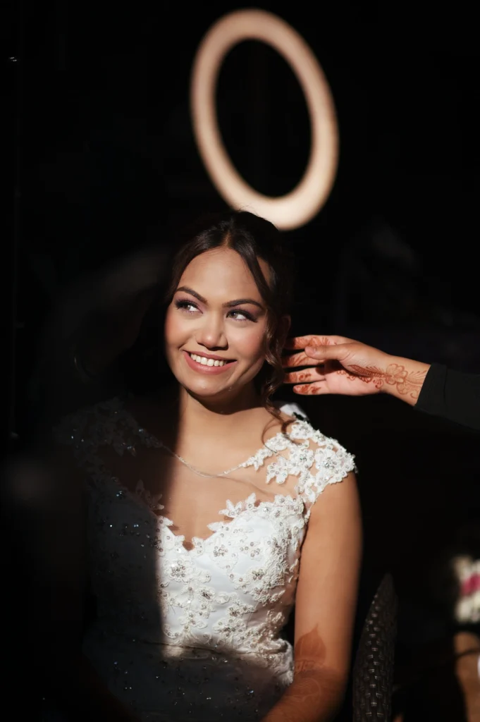 Christian-Hindu Wedding bride portrait showcasing elegant bridal makeup and a beautiful white wedding gown