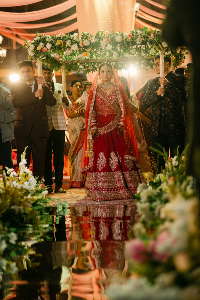 Bride making a grand entry during a luxury wedding ceremony in Dehradun.