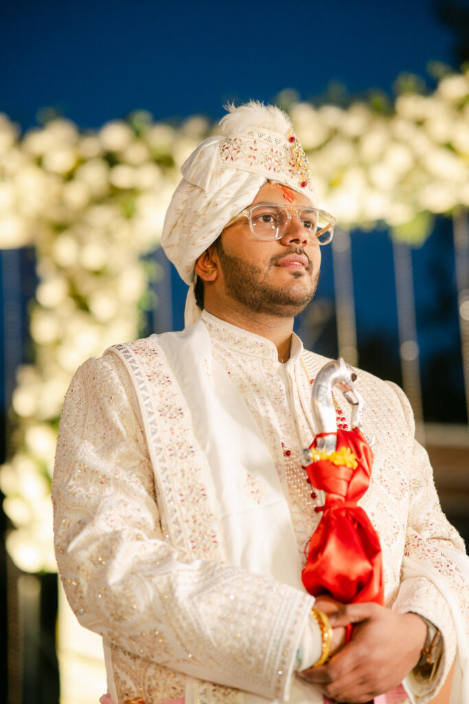Candid groom portrait during an Indian wedding ceremony in Dehradun.