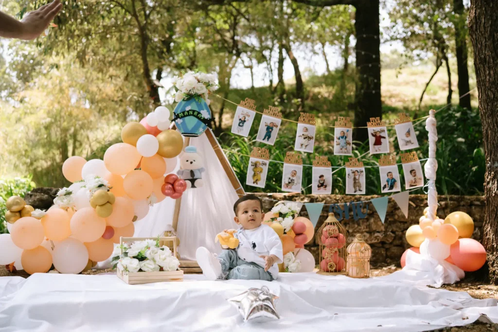 Baby-Manraj's-cake-smash-photoshoot-setup-with-pastel-balloons-and-teepee-at-Hathipaon,-Mussoorie