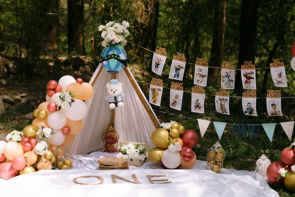 Pastel balloon decor and ONE sign at Manraj's first birthday photoshoot in Mussoorie
