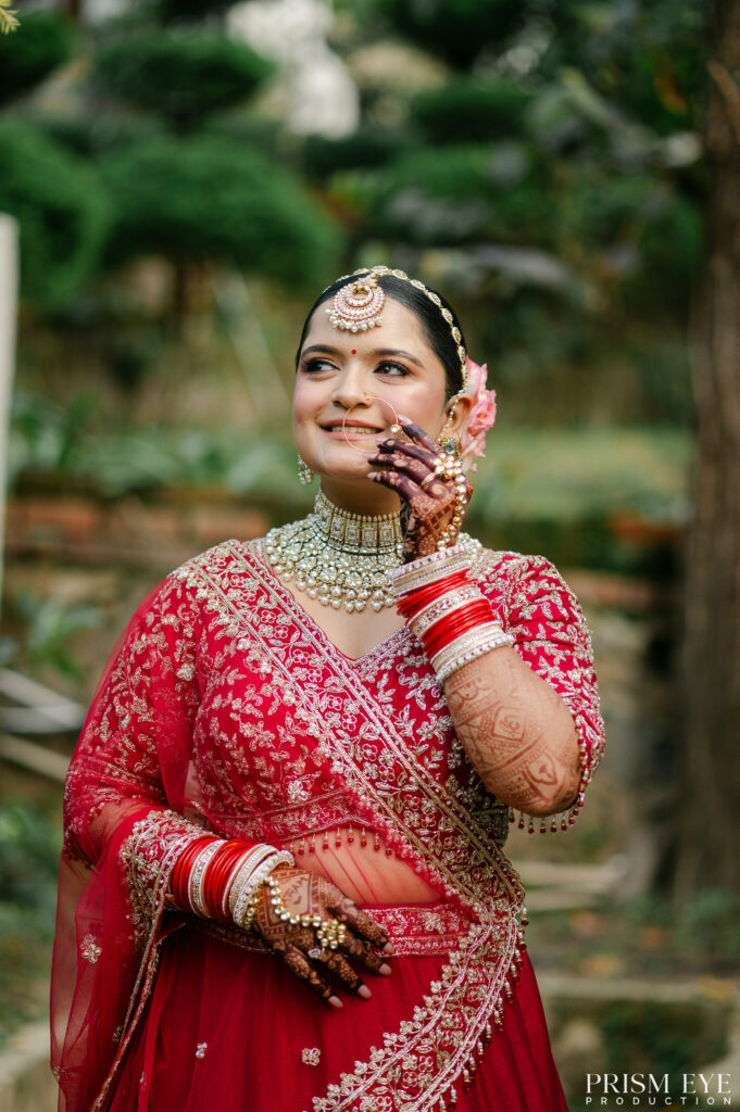 Smiling Indian bride portrait captured during Cinematic Wedding Videography in Dehradun.