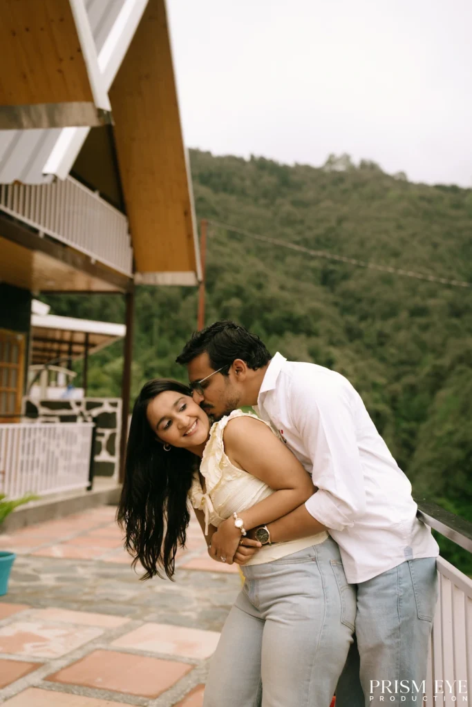 Couple sharing a romantic moment at Bann Resort in Chakrata