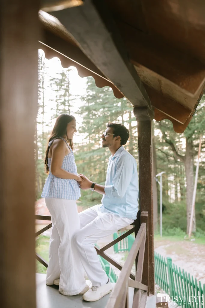 Couple sharing a romantic moment at a cottage in Deodar Forest, Chakrata