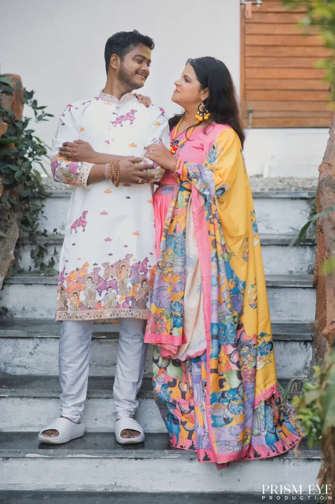 Couple sharing a gentle moment together on the steps during their wedding celebration