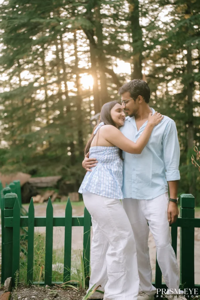 Couple sharing a romantic moment near a forest cottage in Kansar, Chakrata